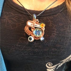 Pendant only hand blown.  Highest bidder, crystal, copper, hand made